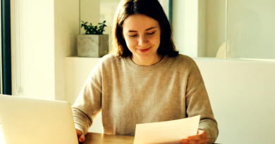 happy woman at desk working from home