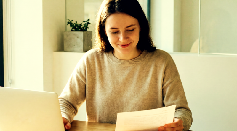 happy woman at desk working from home
