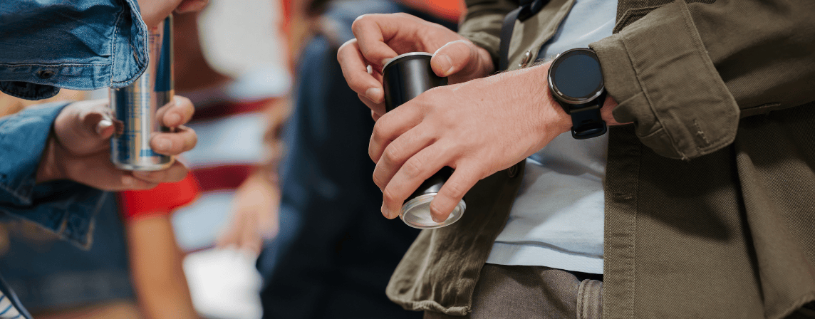 teenagers with energy drinks