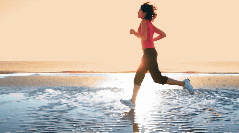 woman running on beach