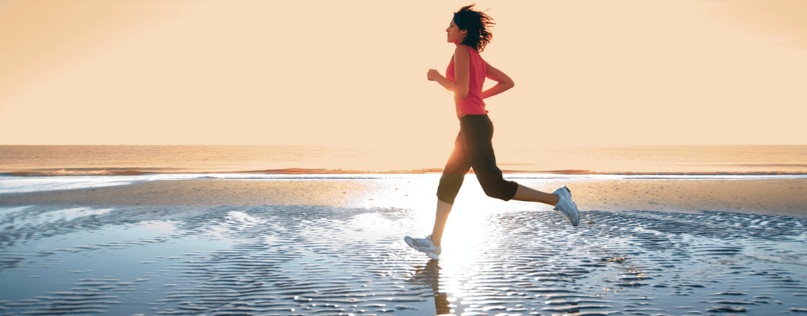 woman running on beach