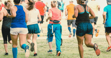 group of adults in a communal park run