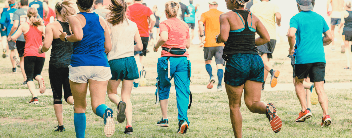 group of adults in a communal park run