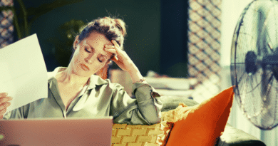 stressed woman at her desk