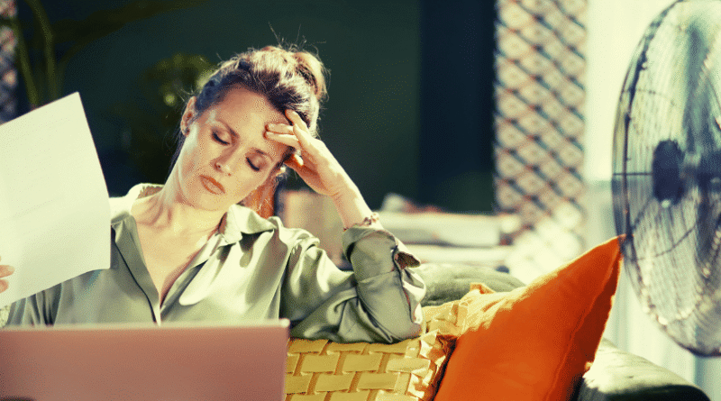 stressed woman at her desk